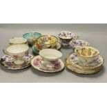 A collection of Continental porcelain tea cups and saucers