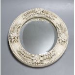 A Belleek oval mirror, first period, length 27cmCONDITION: Provenance - Alfred Theodore Arber-