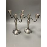 A modern pair of silver two branch, three light candelabra, Birmingham, 1988, 21.1cm, weighted.