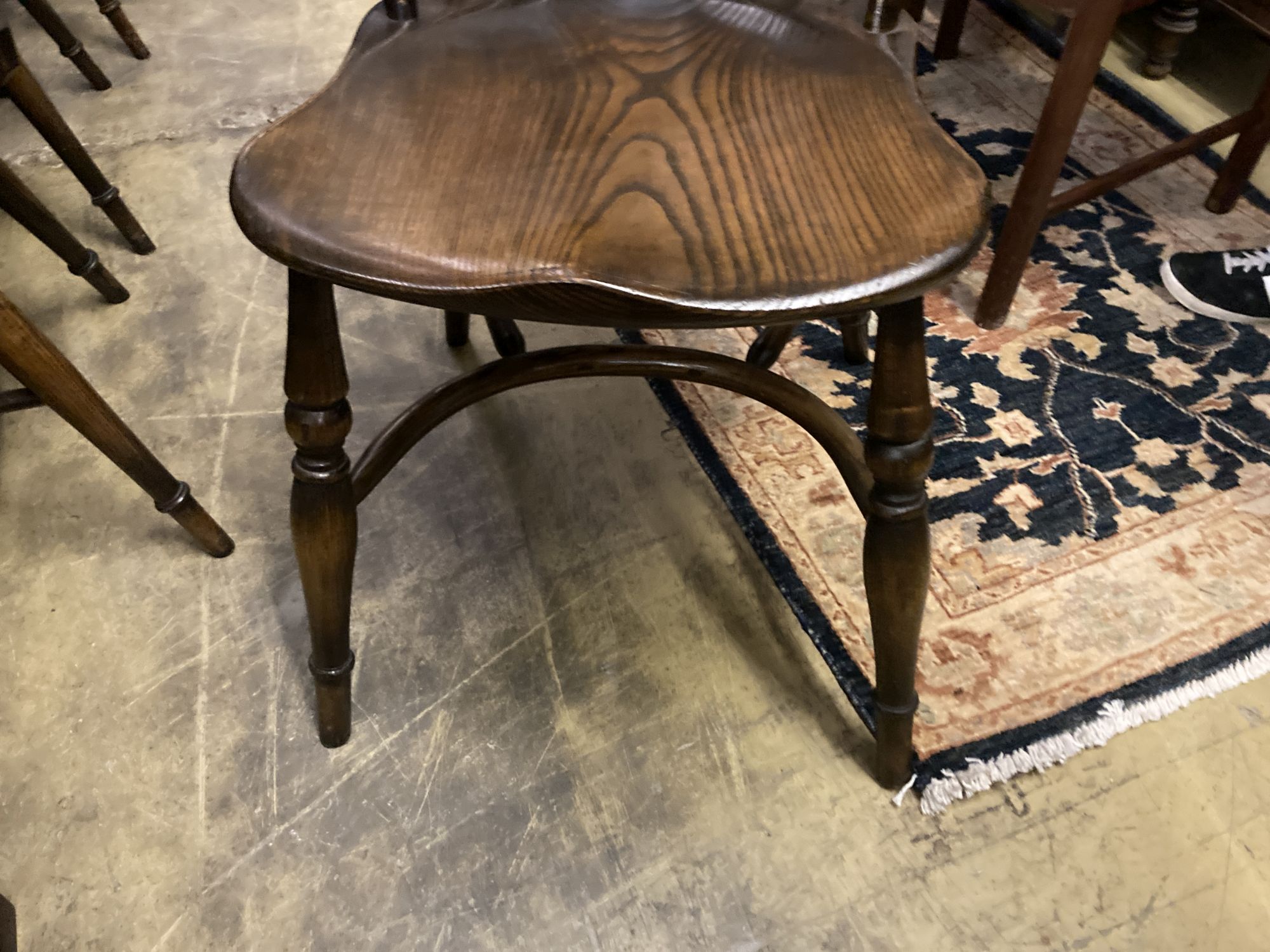 A set of ten stained ash and elm Windsor chairs with crinoline stretchers (two having arms) - Image 6 of 6