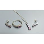 A modern 18ct white gold, pink sapphire and diamond set line pendant, 16mm, on 18ct white gold