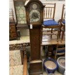 A 1930's oak cased eight day striking and chiming longcase clock, height 169cm