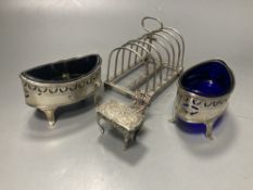 An Edwardian silver seven bar toastrack, William Hutton & Sons, Sheffield, 1909, a.f., a pair of