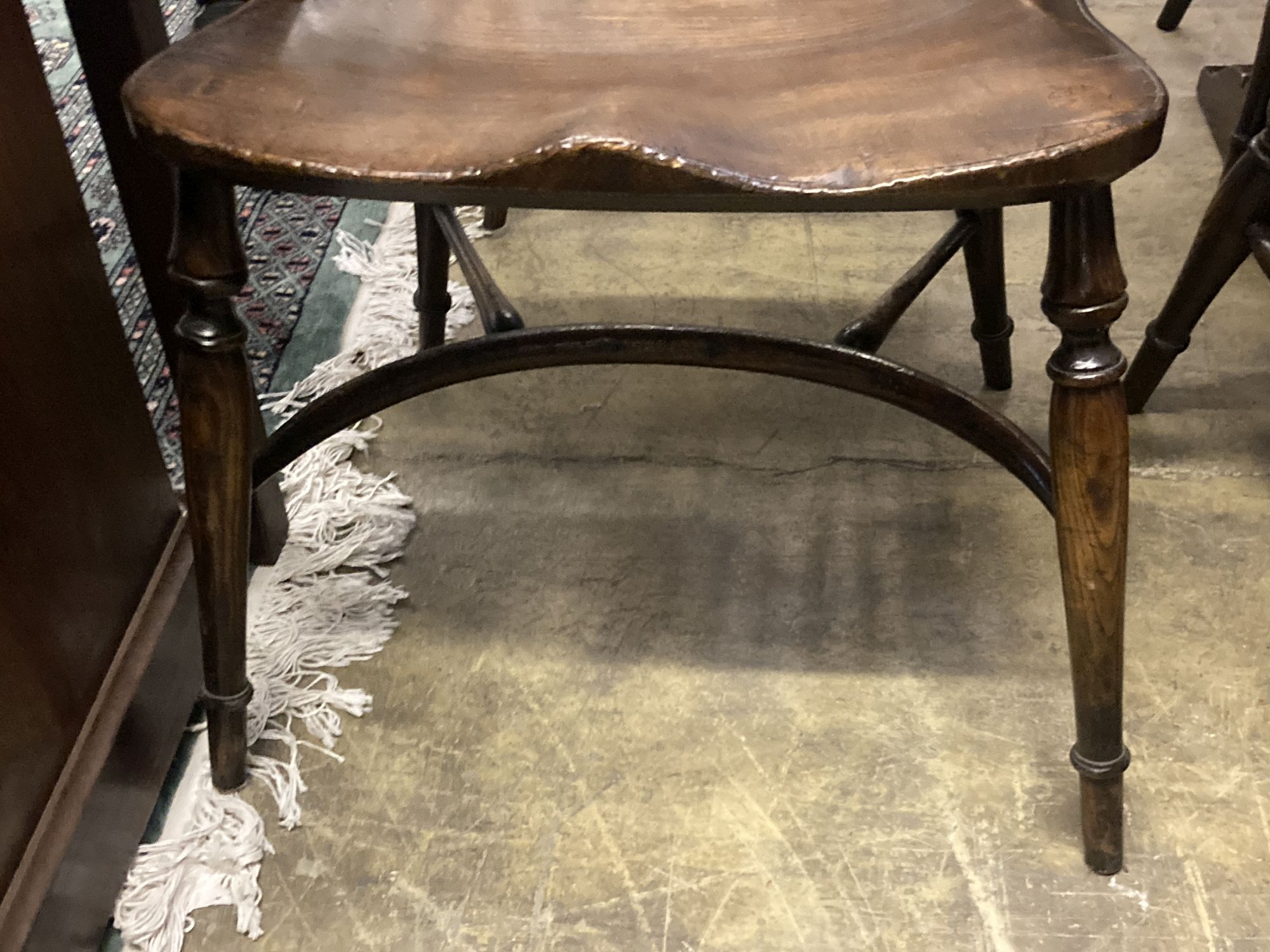 A set of ten stained ash and elm Windsor chairs with crinoline stretchers (two having arms) - Image 3 of 6