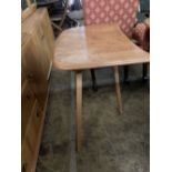 An Ercol elm dining table extension, length 70cm, depth 46cm, height 71cm