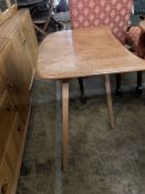 An Ercol elm dining table extension, length 70cm, depth 46cm, height 71cm