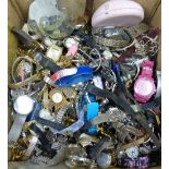 A large quantity of assorted modern lady's and gentleman's wrist watches.