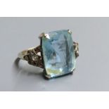 An early 20th century yellow metal, aquamarine and white stone chip set dress ring, size J, gross