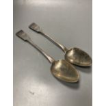 A pair of late George III Irish silver fiddle pattern table spoons, Samuel Neville, Dublin, 1816/17,