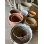 A quantity of assorted terracotta, glazed earthenware and metal garden planters together with a