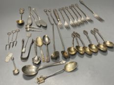 A group of assorted Chinese white metal spoons and forks, including set of six teaspoons and ten