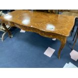 A Louis XVI design marquetry inlaid kingwood serpentine centre table, width 196cm depth 90cm