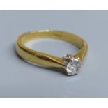 A modern 18ct gold and solitaire diamond ring, size H/I, gross 3 grams.CONDITION: Part of one claw