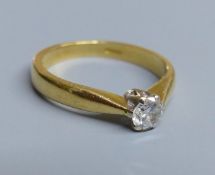 A modern 18ct gold and solitaire diamond ring, size H/I, gross 3 grams.CONDITION: Part of one claw