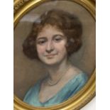 Early 20th century English School, oil on card, Portrait of a lady wearing a pearl necklace, 50 x