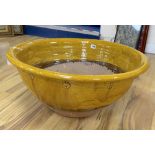 A French pottery large slipware bowl, Dia 69cm