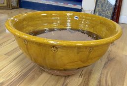 A French pottery large slipware bowl, Dia 69cm