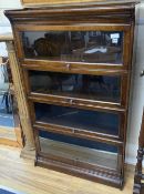 A Globe Wernicke style oak four section bookcase, width 88cm depth 30cm height 140cm