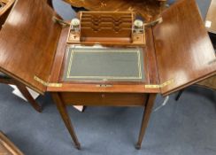 An Edwardian inlaid mahogany 'surprise' writing table, width 48cm depth 49cm height 73cm