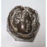 A bronze relief of a cherub, length 13cmCONDITION: Slight rubbing to lower part of wing below the