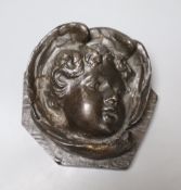 A bronze relief of a cherub, length 13cmCONDITION: Slight rubbing to lower part of wing below the
