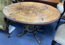 A Victorian oval walnut tilt top centre table, width 88cm depth 55cm height 67cm