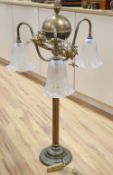 A gilt metal three branch lamp, height 92cm