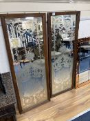 A pair of Victorian oak framed etched glass panels, width 55cm height 144cm