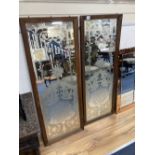 A pair of Victorian oak framed etched glass panels, width 55cm height 144cm