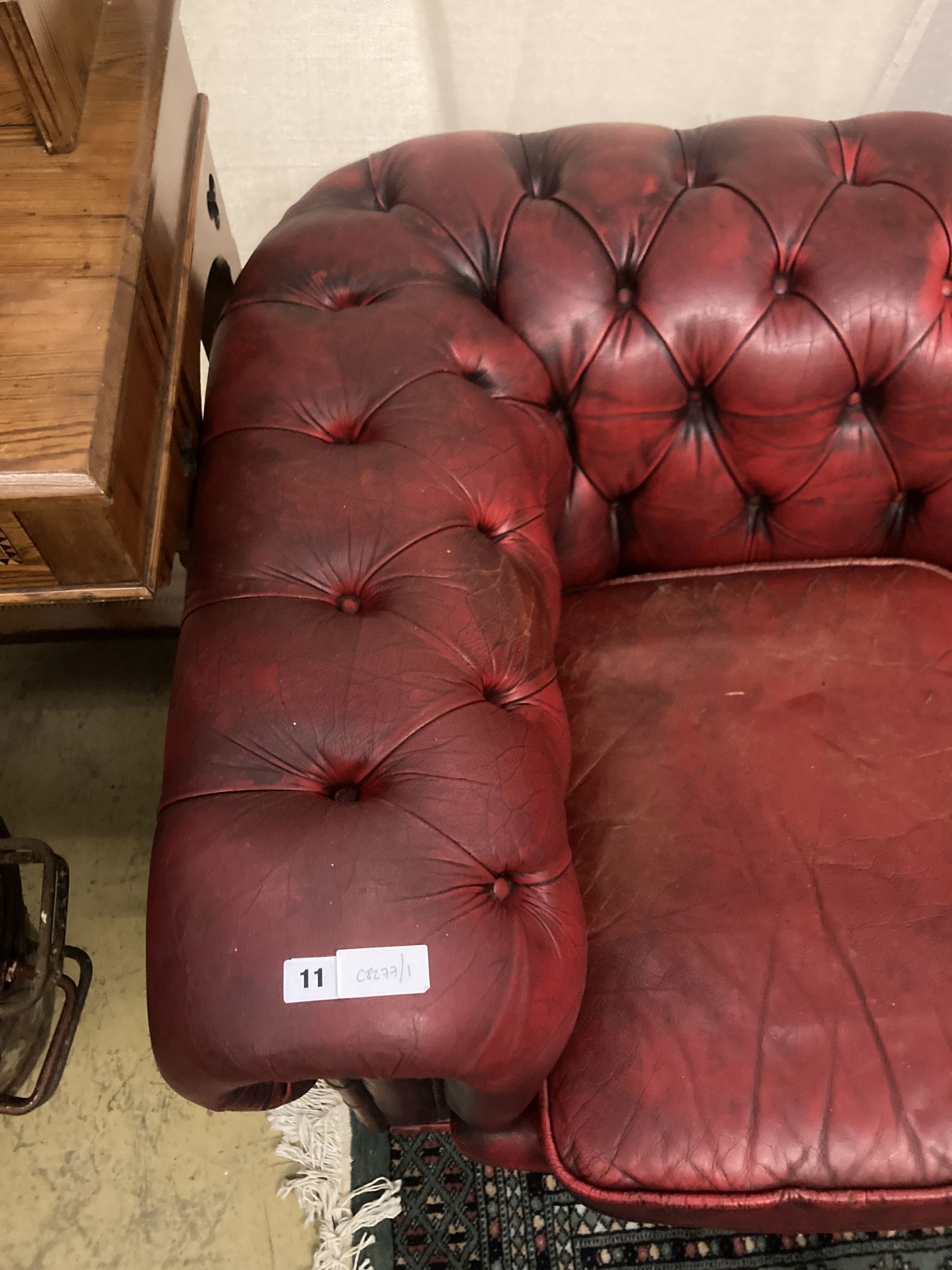 A Victorian style buttoned red leather Chesterfield settee, width 186cm depth 84cm height 66cm - Image 2 of 4