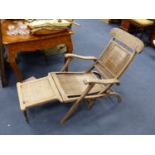 An Anglo Indian caned bleached hardwood steamer chair