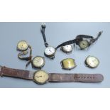 Eight assorted early to mid 20th century silver and white metal wrist watches (a.f.).