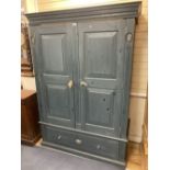 A Victorian style blue painted panelled pine two door wardrobe, width 140cm depth 60cm height 198cm