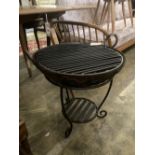 A fire pit with grill and stand, diameter 50cm height 52cm