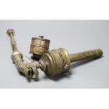 A Himalayan Buddhist brass trumpet and two prayer wheelsCONDITION: Provenance - Alfred Theodore