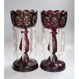 A pair of Victorian ruby glass lustres, height 34cm