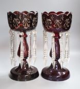 A pair of Victorian ruby glass lustres, height 34cm