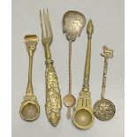 A group of Indian bronze spoons and a forkCONDITION: Provenance - Alfred Theodore Arber-Cooke (c.