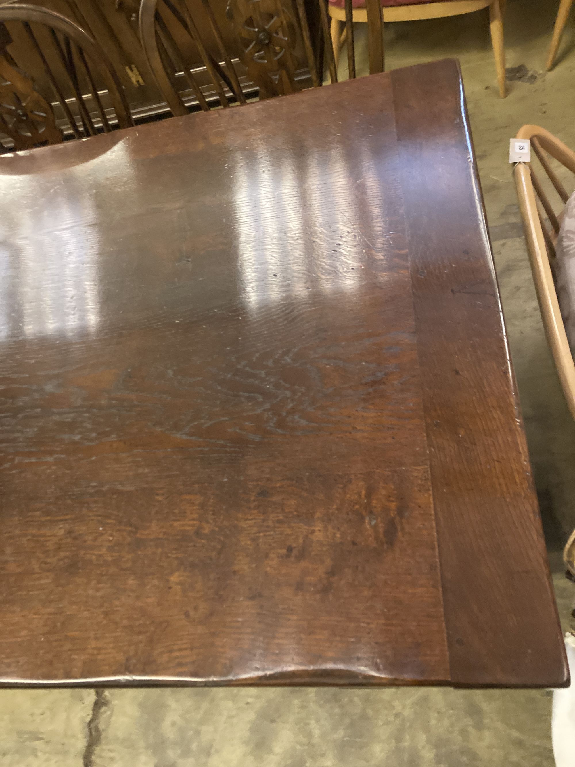 An 18th century style oak refectory table having planked top on double turned end supports, width - Image 3 of 5