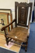 A 19th century oak Wainscot chair, width 64cm depth 49cm height 110cm