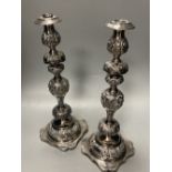 A pair of Edwardian silver 'Sabbath Day' candlesticks, by Rosenzweig & Taitelbaum, London, 1909,