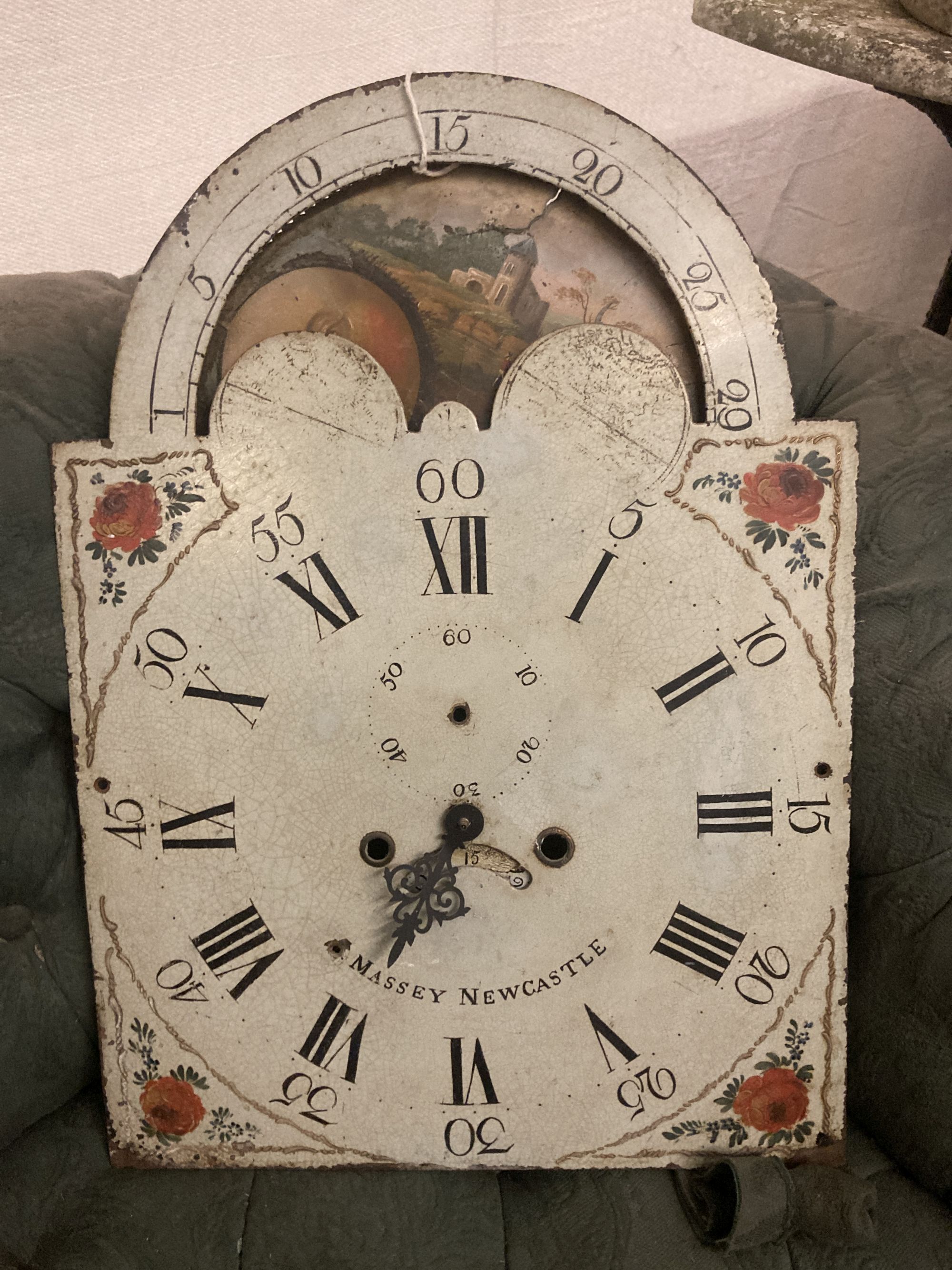 An early 19th century painted longcase clock dial, marked Massey, Newcastle, width 36cm height 50cm