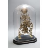 A Victorian brass skeleton clock, under dome