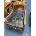 A 19th century Swedish fruitwood elbow chair