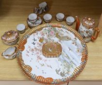 A Kutani part coffee service, with tazza tray base, largest diameter 45cmCONDITION: One cup and