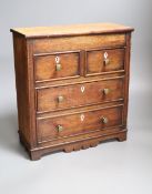 A miniature mahogany chest of drawers, height 33cm