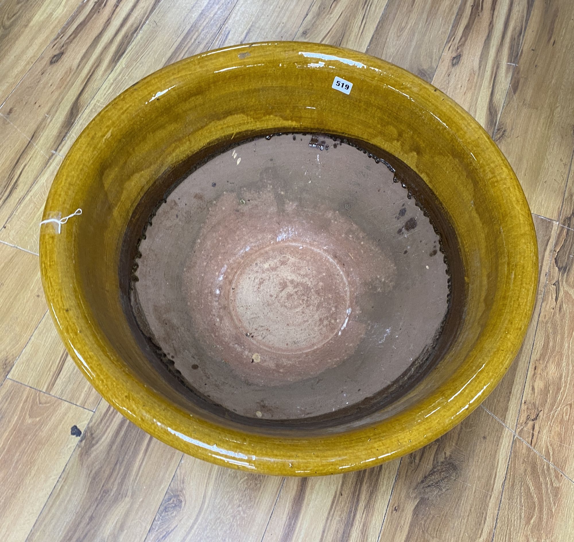 A French pottery large slipware bowl, Dia 69cm - Image 2 of 2