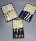 A cased set of six George V mother of pearl handled silver cake knives, William Hutton & Sons,