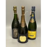 Three bottles of Champagne, including Krug Grande Cuvee, Heidsieck Blue Top Brut Monopole and Brut