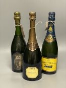 Three bottles of Champagne, including Krug Grande Cuvee, Heidsieck Blue Top Brut Monopole and Brut